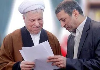 غلامعلی رجایی در کنار آیت الله هاشمی رفسنجانی