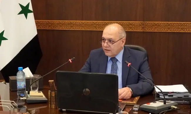 Syrian Prime Minister Mohammed Qazi al-Jalali left his home to hand over his official authority to armed groups.